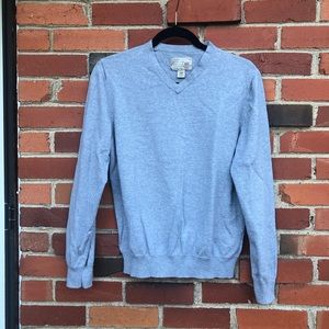Grey V-neck sweater